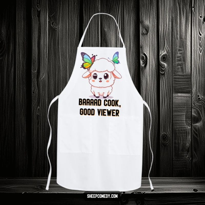 Funny sheep apron showing a sheep with wide, surprised eyes looking at a rainbow butterfly, bringing wonder to the kitchen.