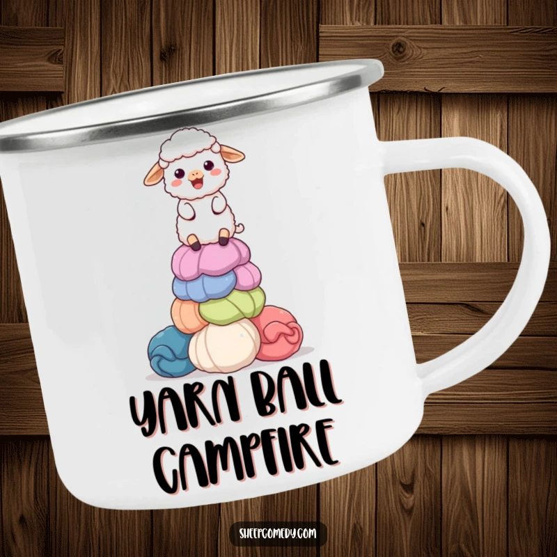 Funny enamel camping mug with a delighted sheep balancing a stack of colorful, giant wool balls, built for comfort and a humorous sip.