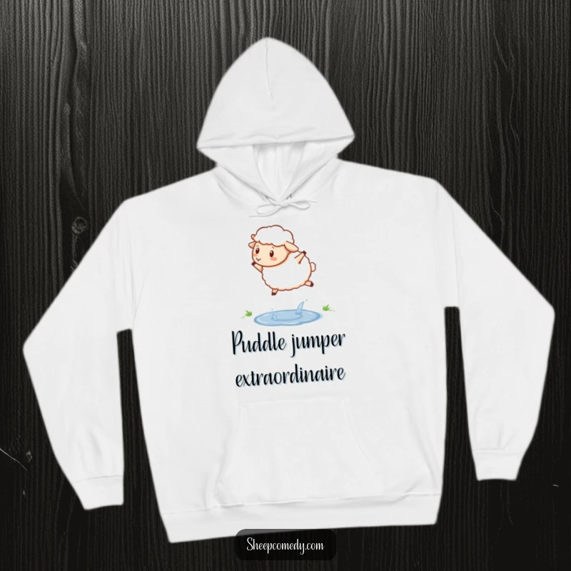 Funny sheep hoodie featuring a determined sheep hopping over a sparkling puddle, cozy and motivational design.