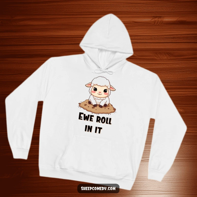 Funny sheep hoodie depicting a sheep with a contented face rolling gleefully in loose soil, perfect for cozy, humorous wear.