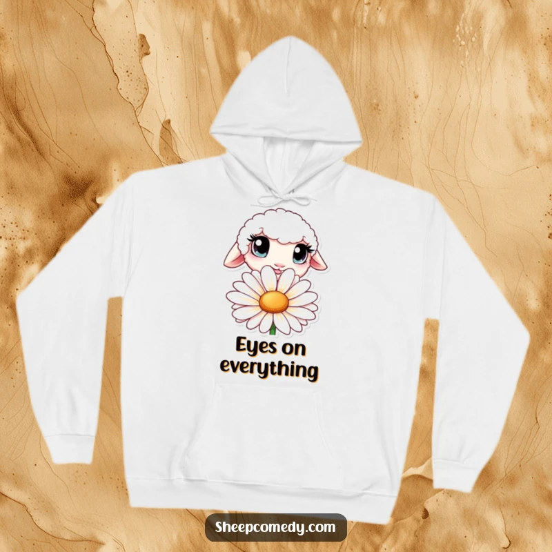 Funny hoodie showcasing a sheep with oversized, curious eyes peeking from behind a large daisy.