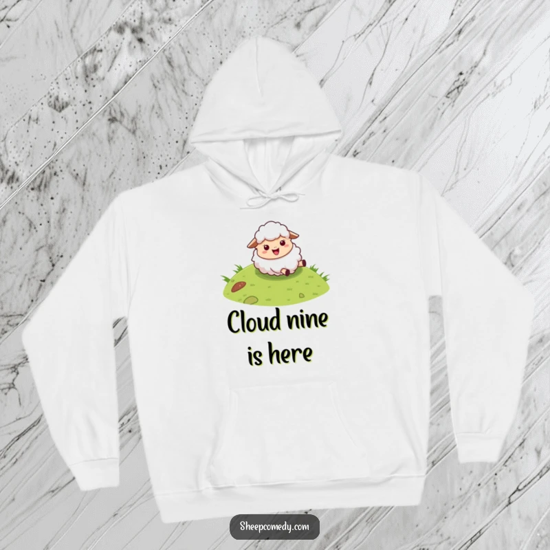 Funny sheep hoodie showing a fluffy character joyfully rolling down a grassy hill, perfect for a cozy laugh.