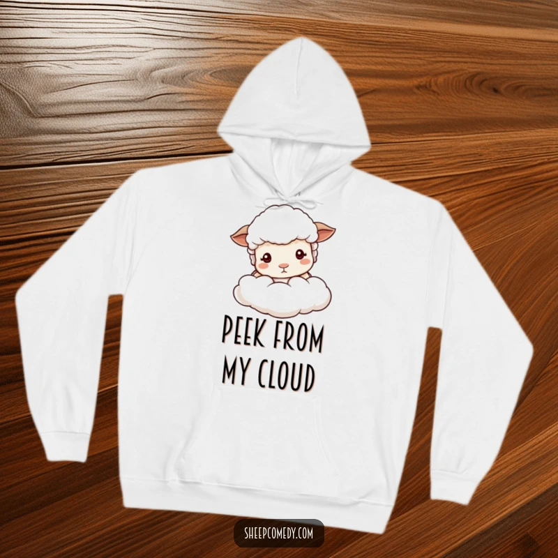 Funny sheep peeking hoodie, depicting mild-eyed sheep emerging from a soft cloud, perfect for cozy and peaceful lounging.