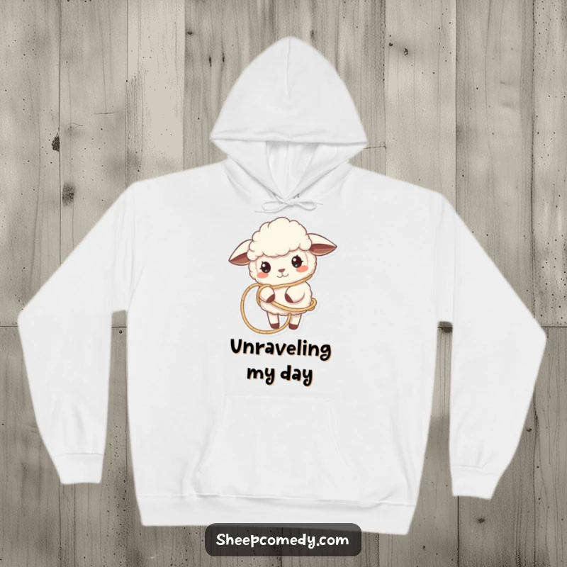 Funny Sheep Hoodie shows a sheep playfully tangled in yarn, combining warmth with whimsical and humorous crafting-themed art.