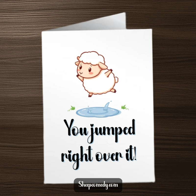 Funny Free Printable Congrats Card: A sheep determinedly jumps over a small, glittering puddle, signifying achievement.