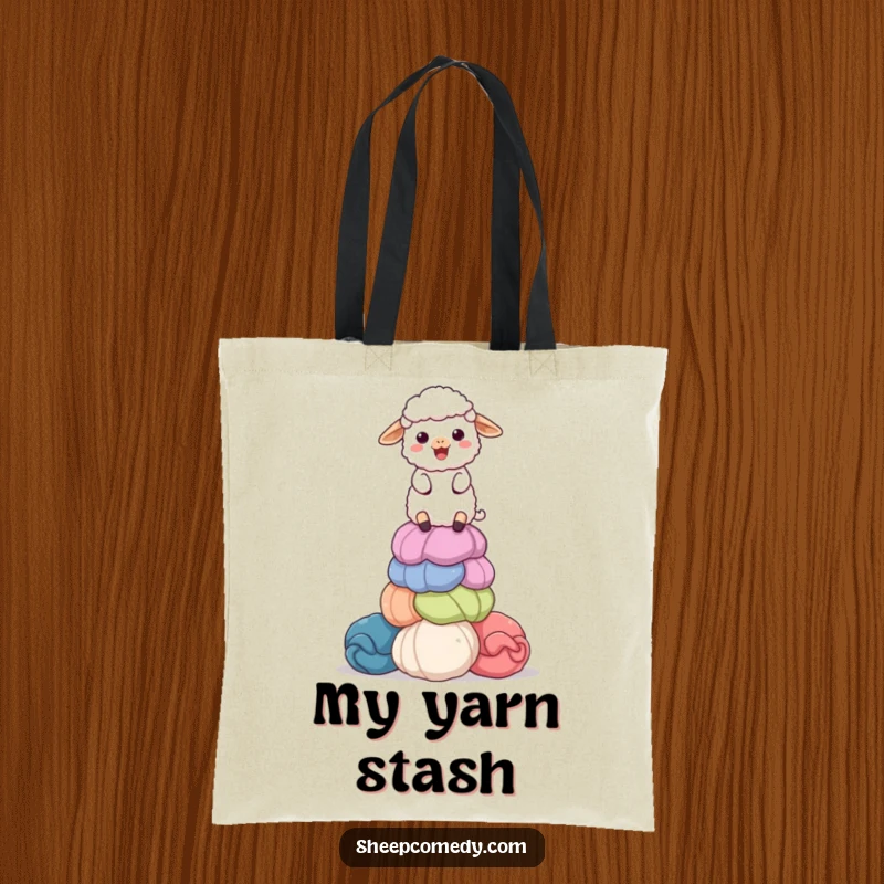 Funny tote bag with a delighted sheep character balancing a colorful, giant stack of wool balls, perfect for carrying supplies with humor.